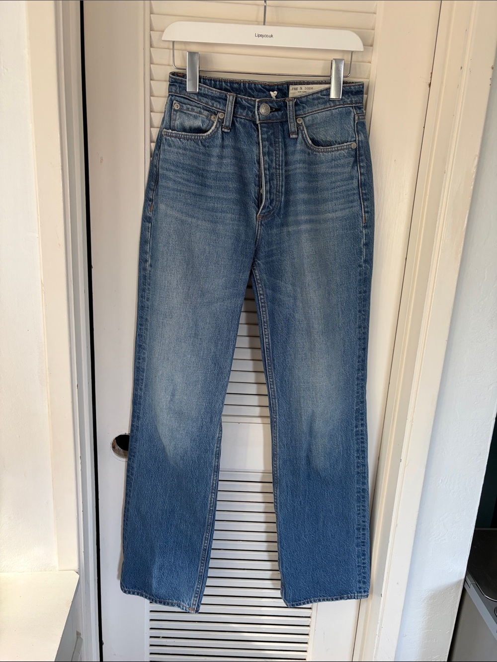 Alex high-rise straight five button fly in clean mick wash
